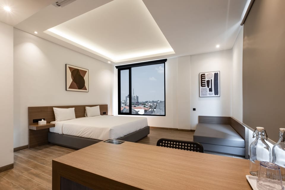 Executive Double Room, City View | Desk, blackout drapes, iron/ironing board, free WiFi