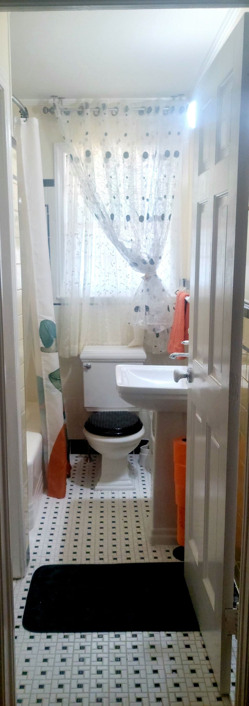 Combined shower/tub, free toiletries, hair dryer, slippers