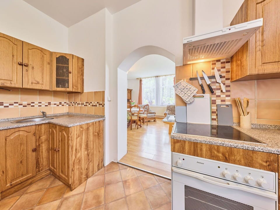 Flooring, Interior Design, Kitchen, Floor, Wood, Cabinetry, Countertop, Ceiling, Furniture, Room