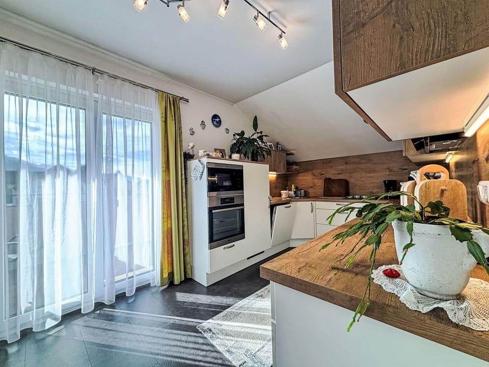 Interior Design, Furniture, Flooring, Wood, Kitchen, Ceiling, Countertop, Floor, Light Fixture, Lighting