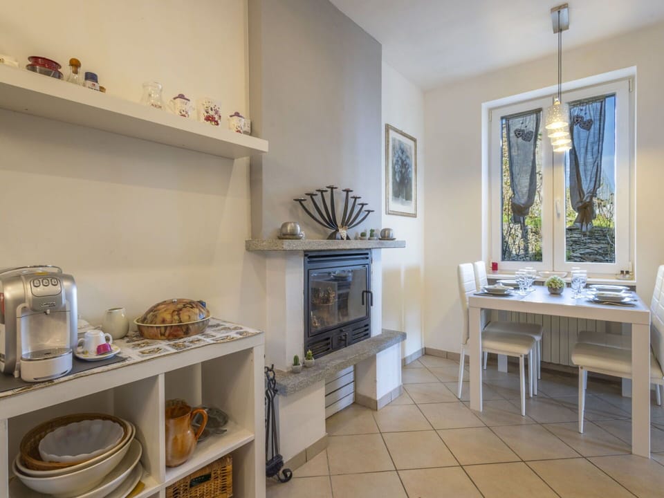 Furniture, Interior Design, Wood, Ceiling, Room, Flooring, Lighting, Floor, Table, Chair