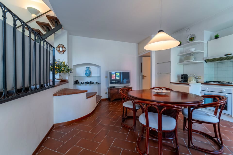 Apartment, 2 Bedrooms, Balcony, Lake View | Living area | 30-inch TV with satellite channels