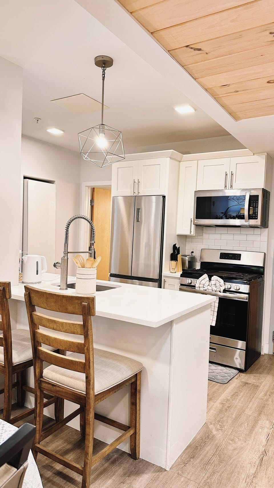 Bright, open kitchen blending seamlessly with the living space.