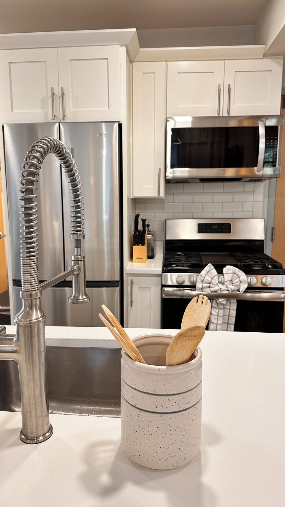 Bright, open kitchen blending seamlessly with the living space.