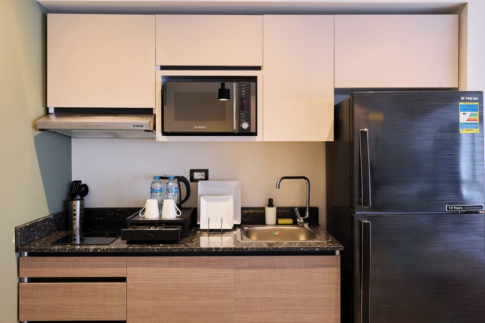 Superior Studio, City View | Private kitchen | Mini-fridge, microwave, coffee/tea maker, electric kettle