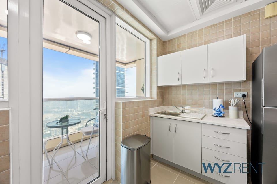 Apartment, Sea View | Private kitchen | Full-size fridge, microwave, oven, stovetop