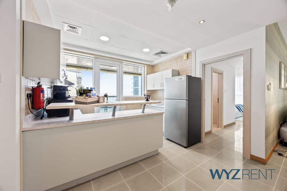 Apartment, Sea View | Private kitchen | Full-size fridge, microwave, oven, stovetop