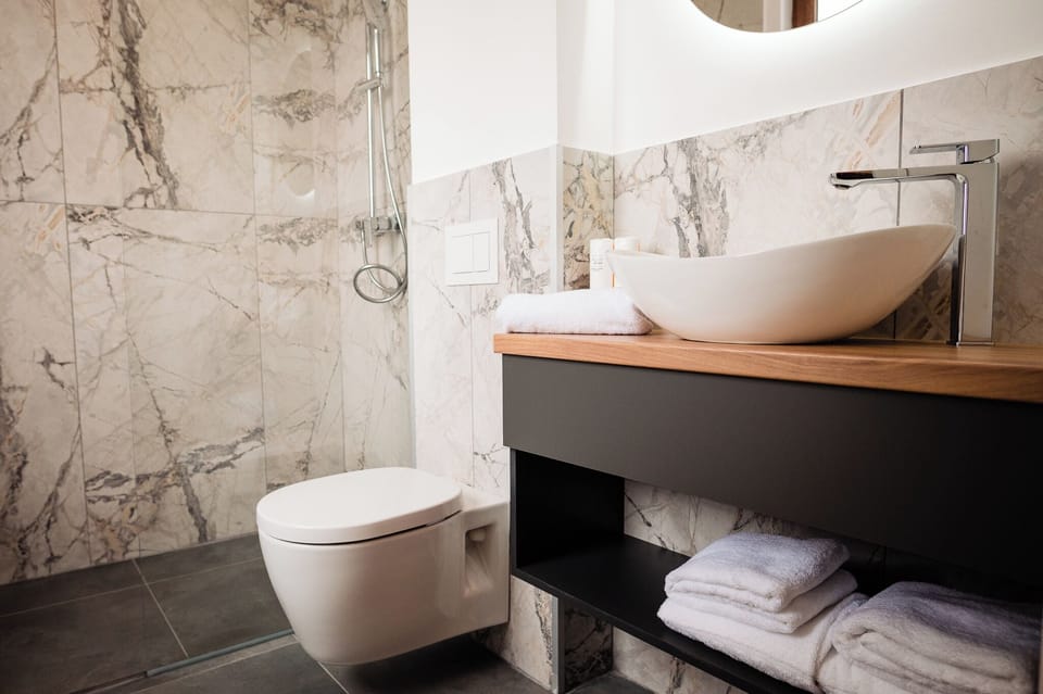 Family Studio | Bathroom | Shower, hair dryer, towels, soap