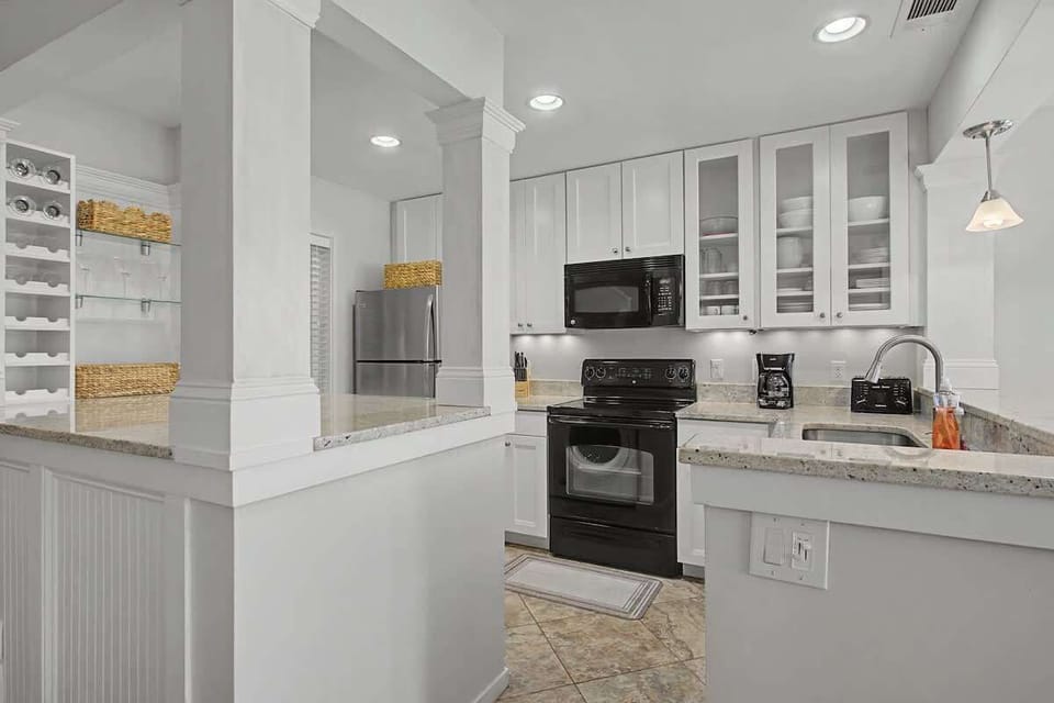 Your fully-equipped kitchen awaits with granite counters, stainless appliances, and abundant storage for creating memorable meals together.
