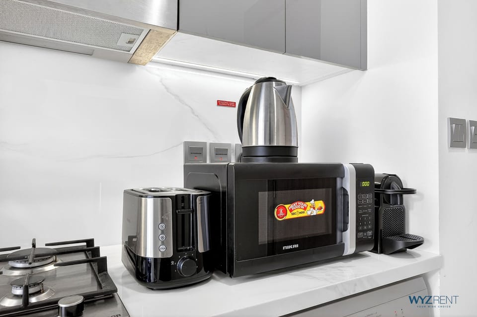 Standard Apartment, Pool View | Private kitchen | Full-size fridge, microwave, stovetop, electric kettle
