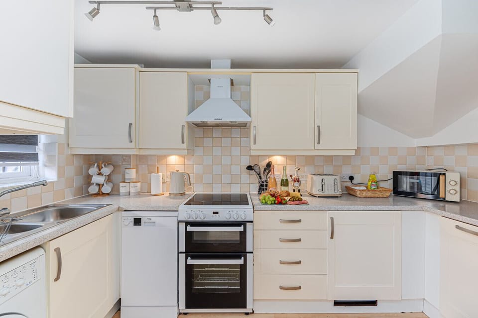 Enjoy a fully equipped kitchen stocked with everything you need to create home-cooked meals.