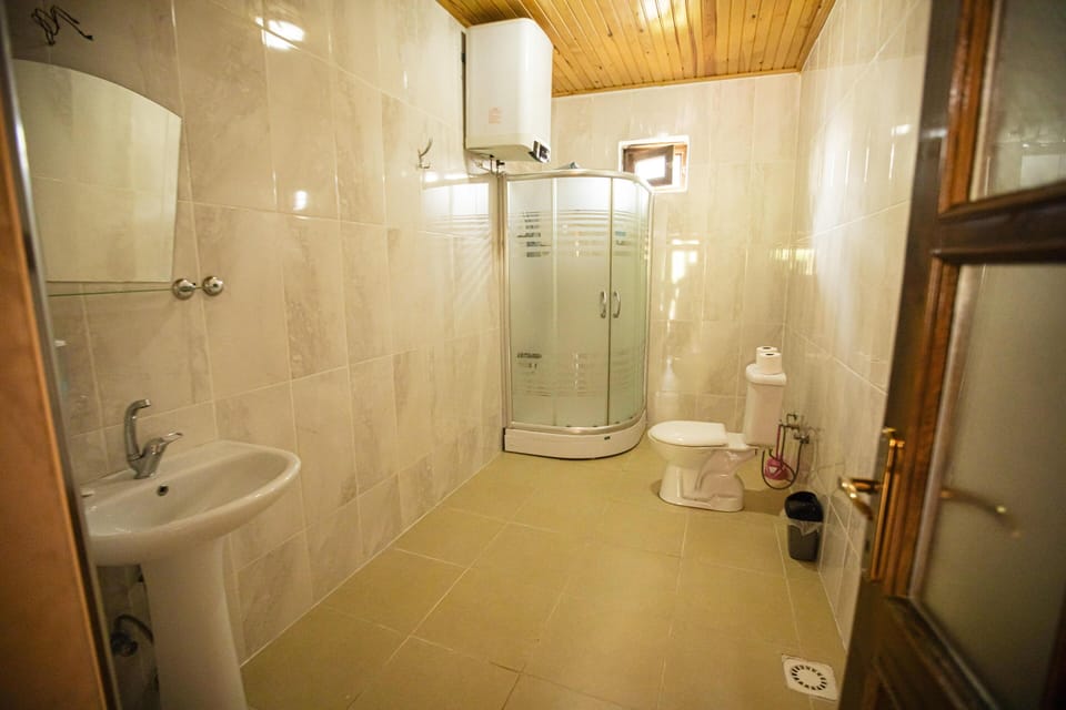 Shower, free toiletries, towels, soap