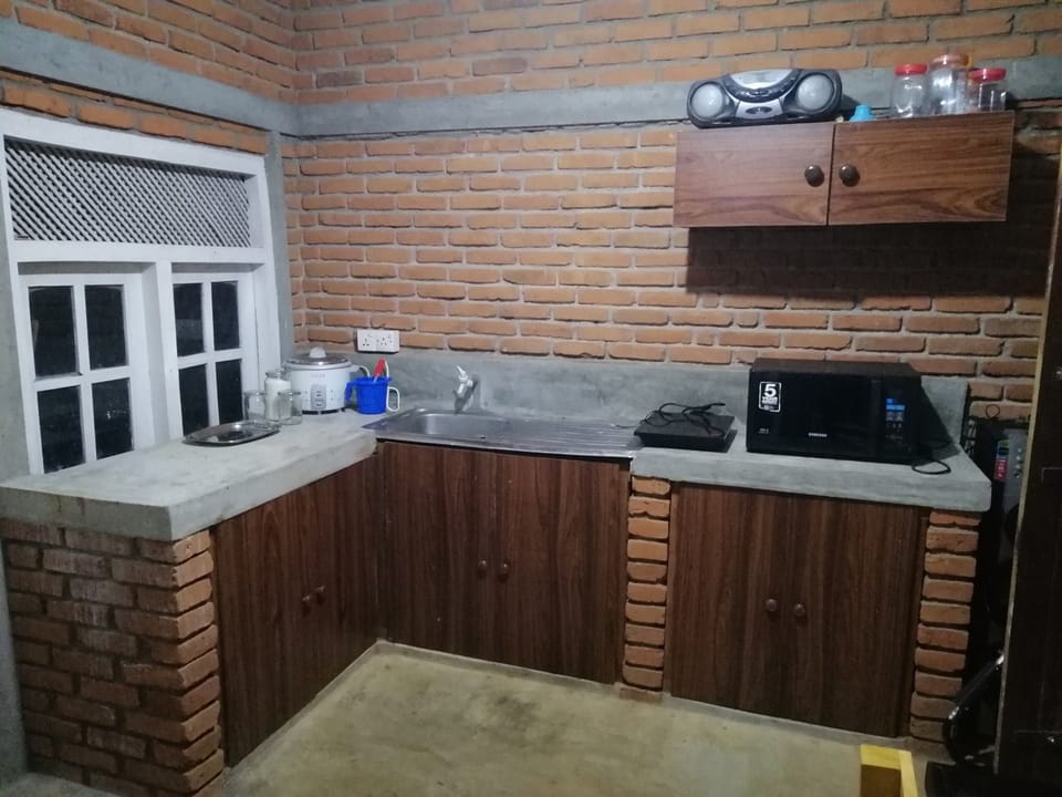 Mini-fridge, microwave, cookware/dishes/utensils