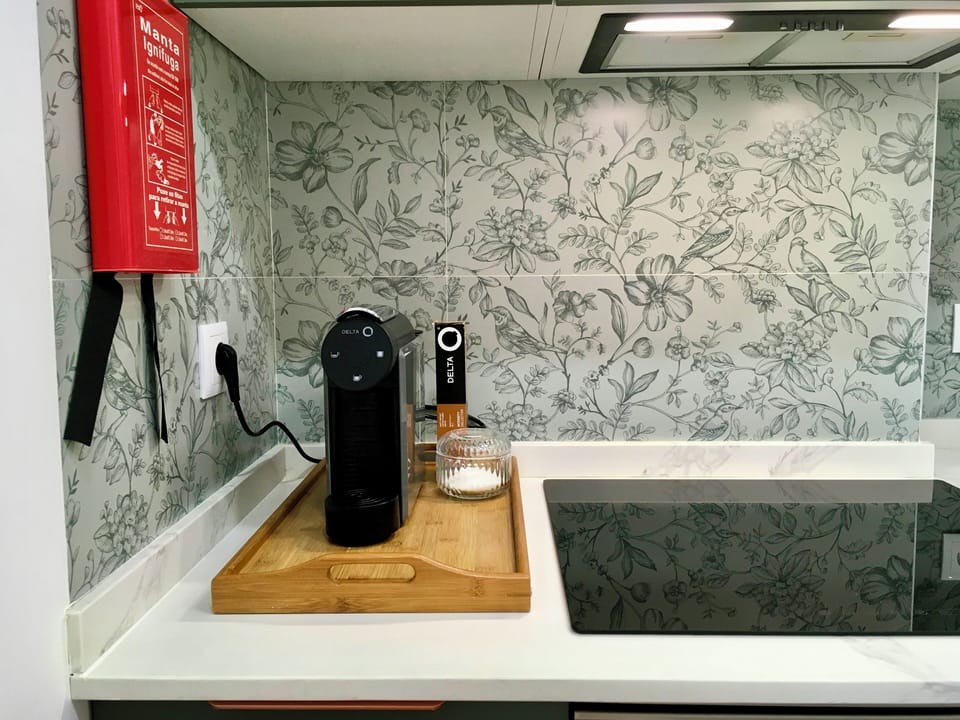 Máquina de café Delta e Café