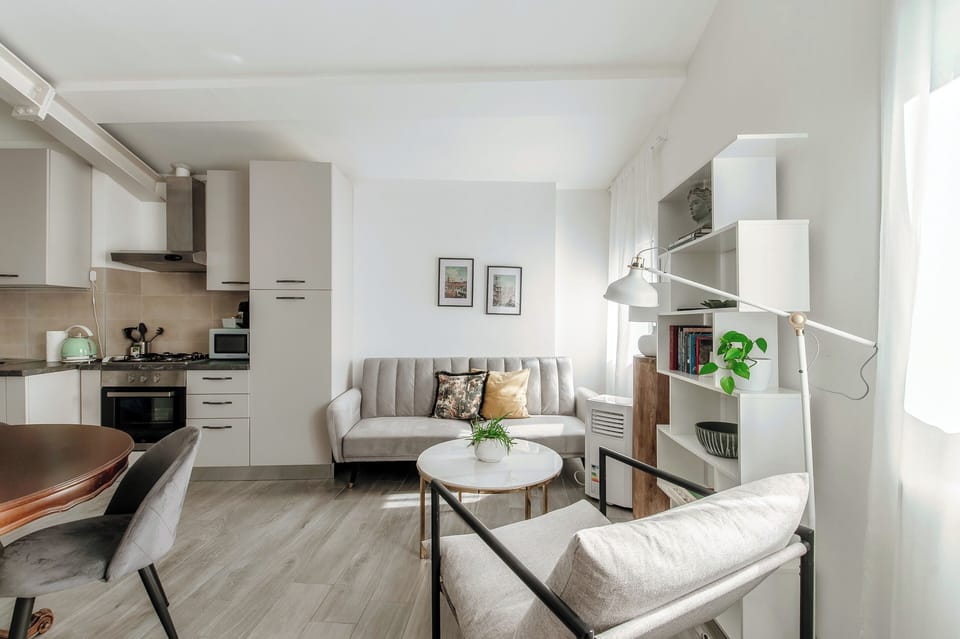 Apartment, City View | Living area | Flat-screen TV