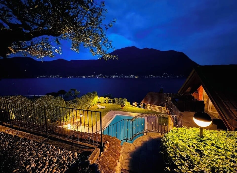 The Pool. The Villa. That view. Villa Rosa illuminated at night.