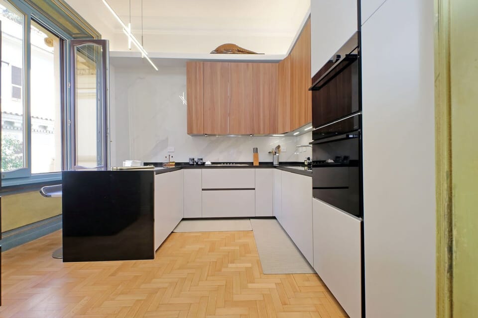 Apartment | Private kitchen | Highchair, cleaning supplies