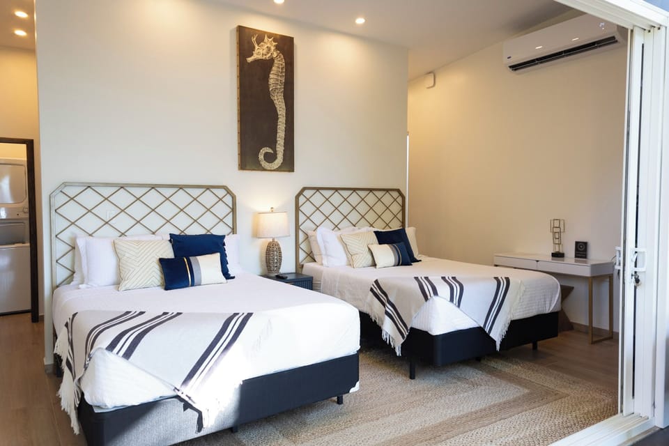 Luxury Villa, 2 Queen Beds, Sea View | Premium bedding, minibar, in-room safe, laptop workspace