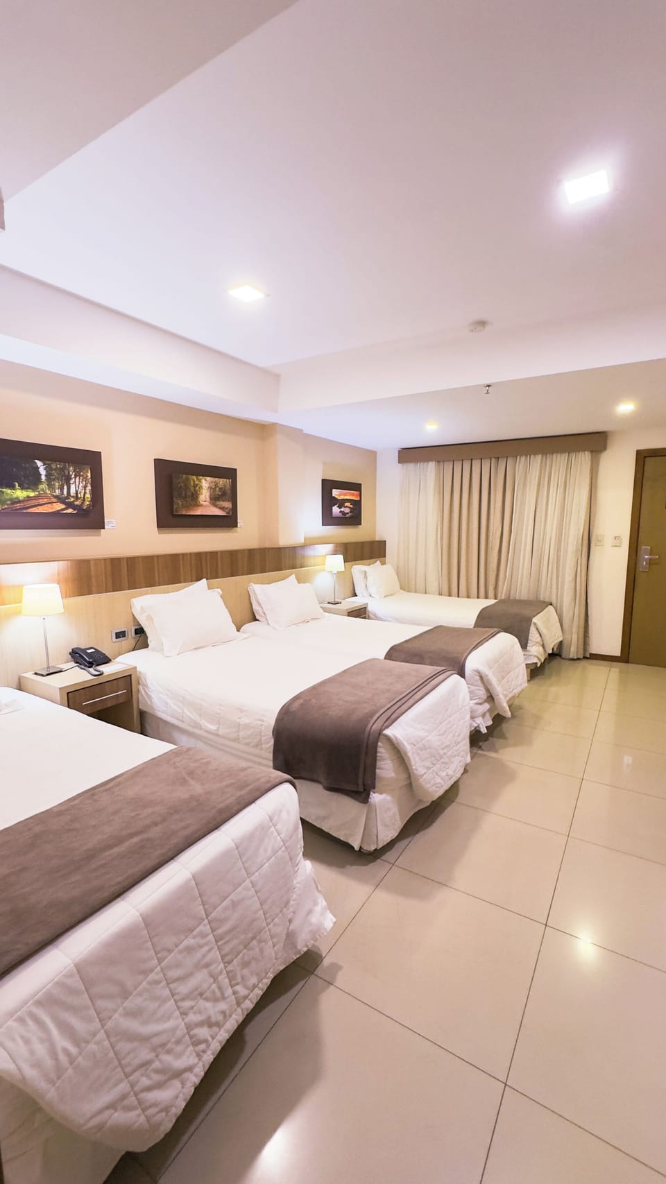 Comfort Quadruple Room | Premium bedding, down comforters, in-room safe, desk