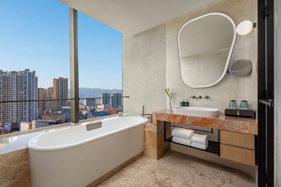 Hair dryer, bathrobes, slippers, towels