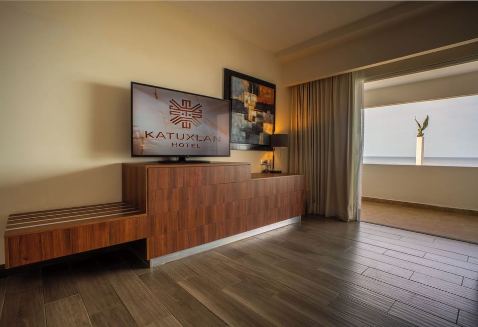 Deluxe Studio Suite, Sea View | Premium bedding, in-room safe, blackout drapes, iron/ironing board