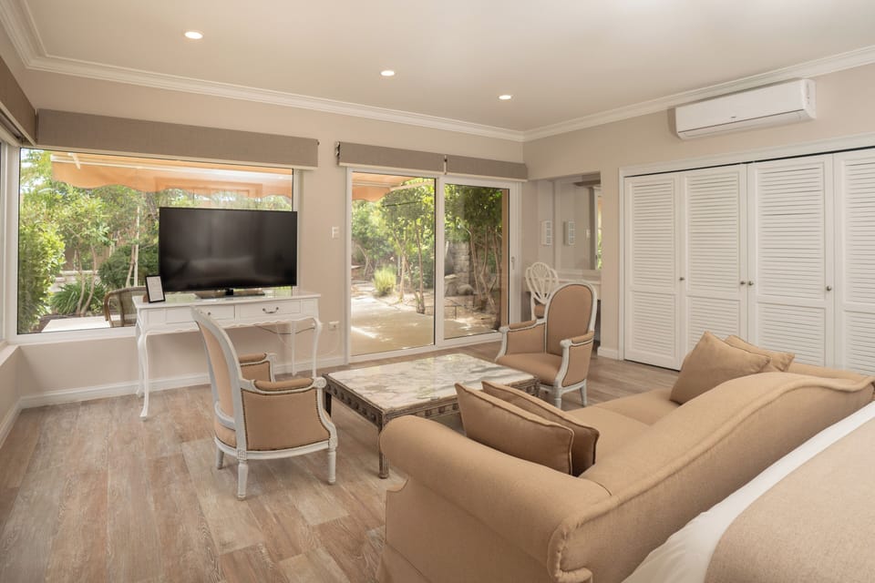 Deluxe Double Room, Patio, Garden View | In-room safe, desk, free WiFi, bed sheets