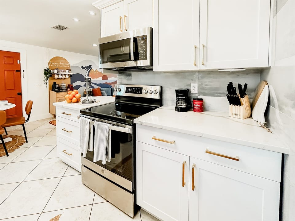 Kitchen Stocked with Essential: Utensils, Pots & Pans, Cookware, S'more Roasting Sticks & Full Oven + Microwave
