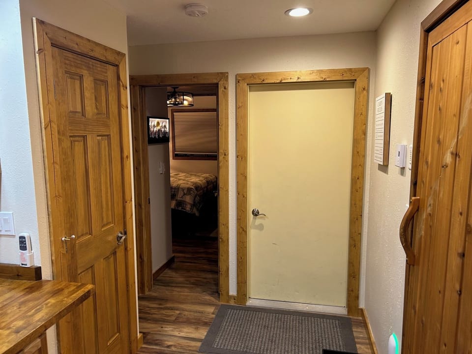 Jetted tub room to the right, bedroom ahead.