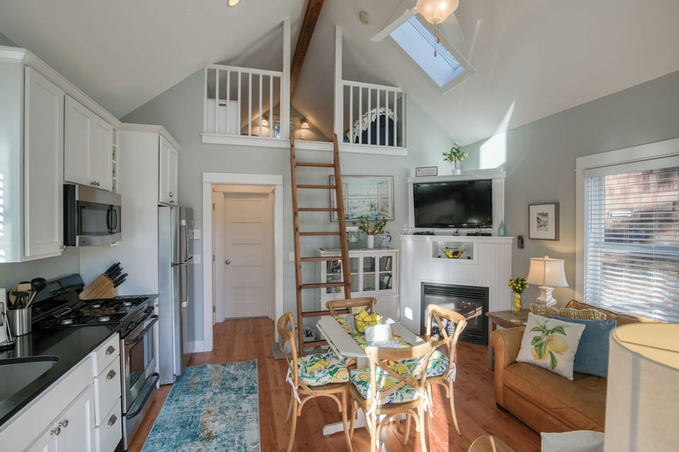 The living room, dining room, and kitchen.