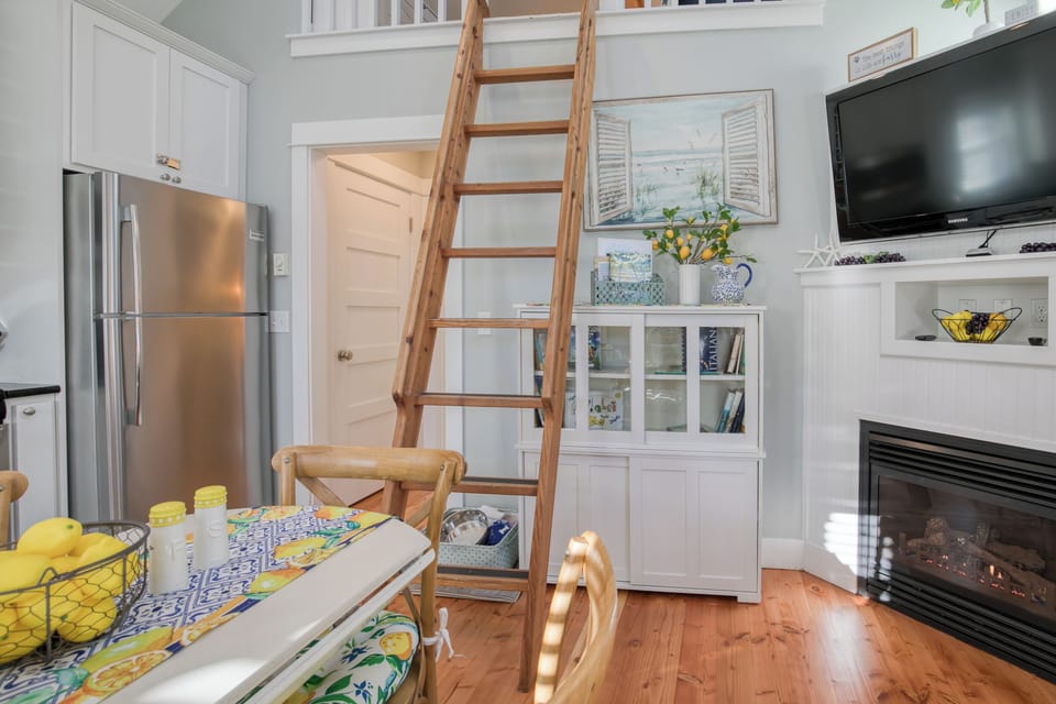The ladder to the loft is in the living room