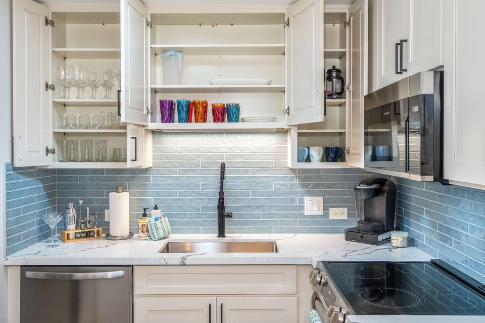 Luxury Apartment, Lanai, Garden View | Private kitchen | Electric kettle, toaster