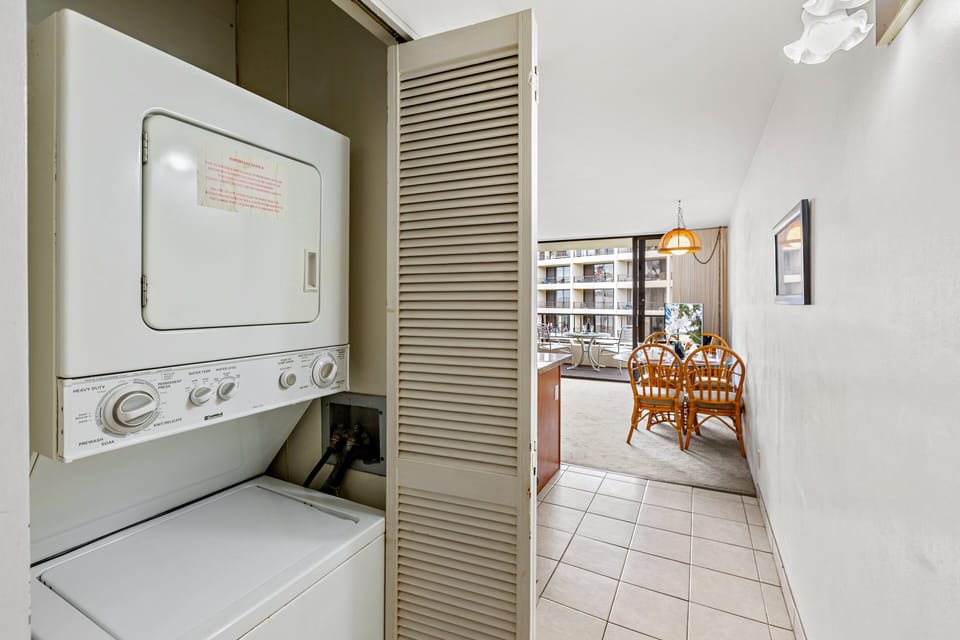 Enjoy the convenience of a stacked washer and dryer, perfect for keeping your beachwear fresh during your stay.