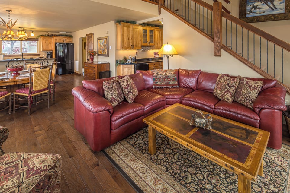 Ample seating on this large leather couch | Main Level