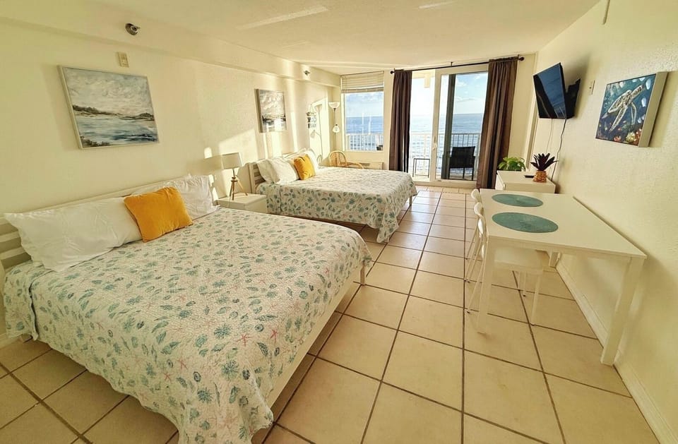 Experience tranquility and rest in this inviting bedroom facing the ocean!
