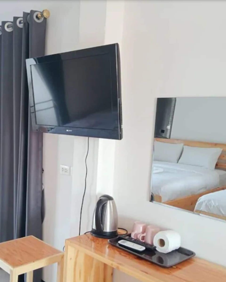 Comfort Room, Balcony | Blackout drapes, free WiFi