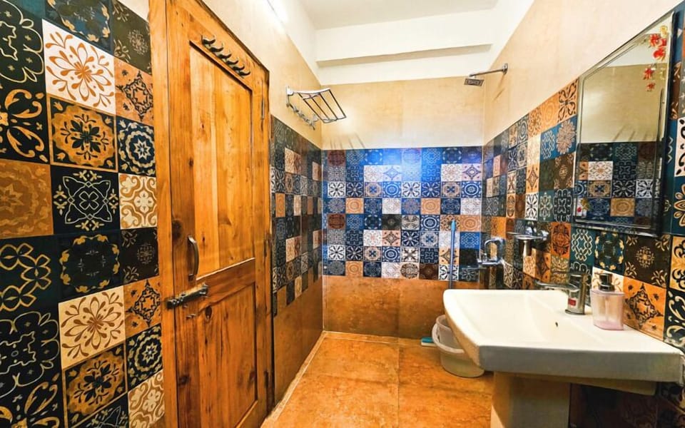 Deluxe Double Room, Balcony, Mountain View | Bathroom | Shower, free toiletries, towels, soap