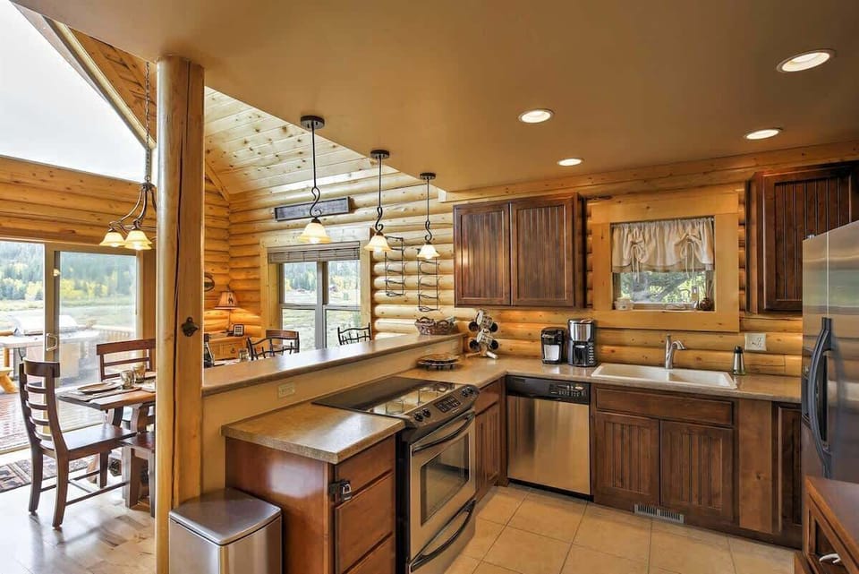 Rustic kitchen with modern appliances and stunning views