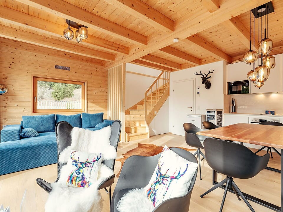 Wood, Interior Design, Home, Furniture, Wood Flooring, Ceiling, Flooring, Lighting, Room, Cottage