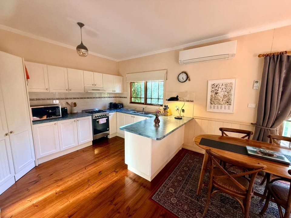 Open Kitchen while being part of entertainment at living space