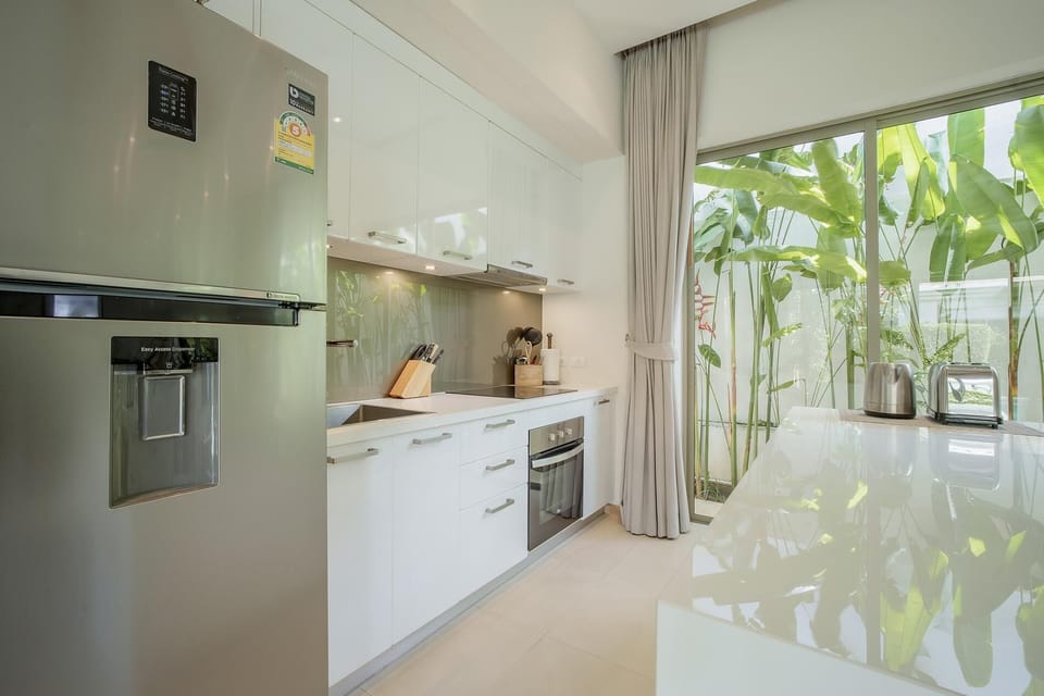 Villa (3 Bedrooms) | Private kitchen | Microwave, oven, highchair, spices