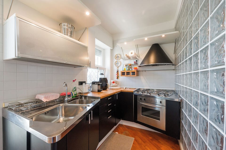 Deluxe Apartment, City View | Private kitchen | Full-size fridge, oven, stovetop, espresso maker