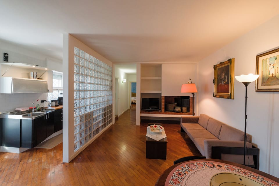 Deluxe Apartment, City View | Living area | Fireplace