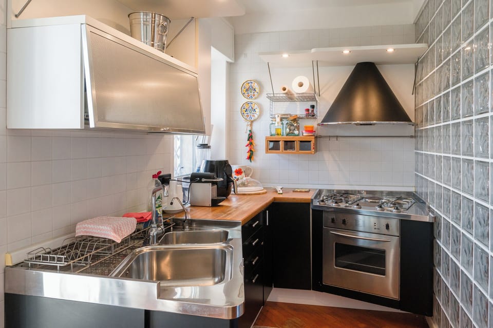 Deluxe Apartment, City View | Private kitchen | Full-size fridge, oven, stovetop, espresso maker