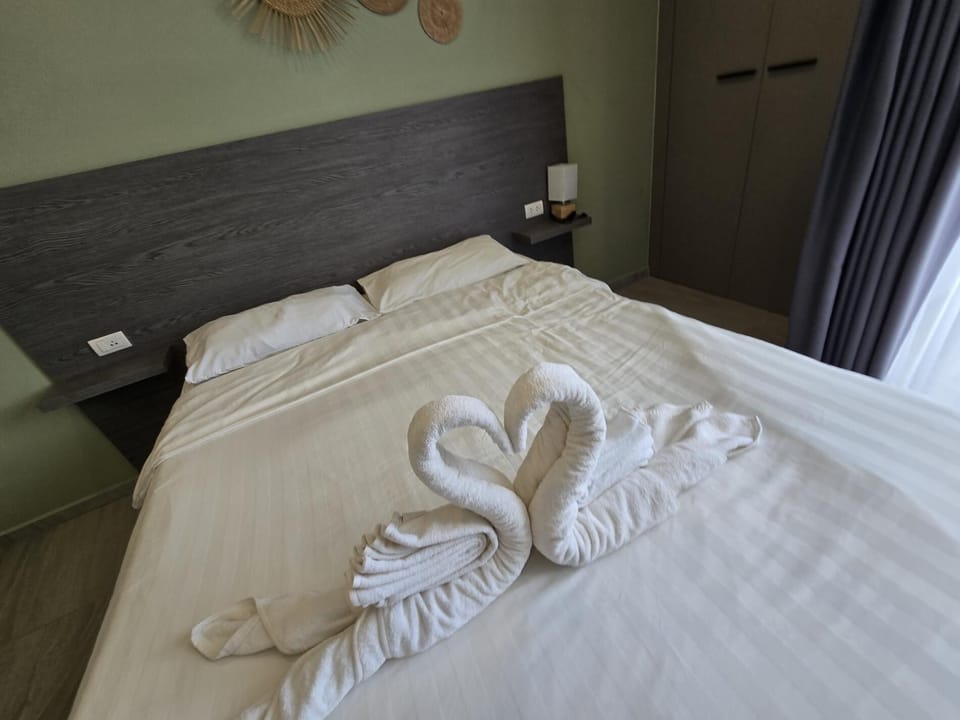 Apartment, Balcony | In-room safe, blackout drapes, iron/ironing board, free WiFi