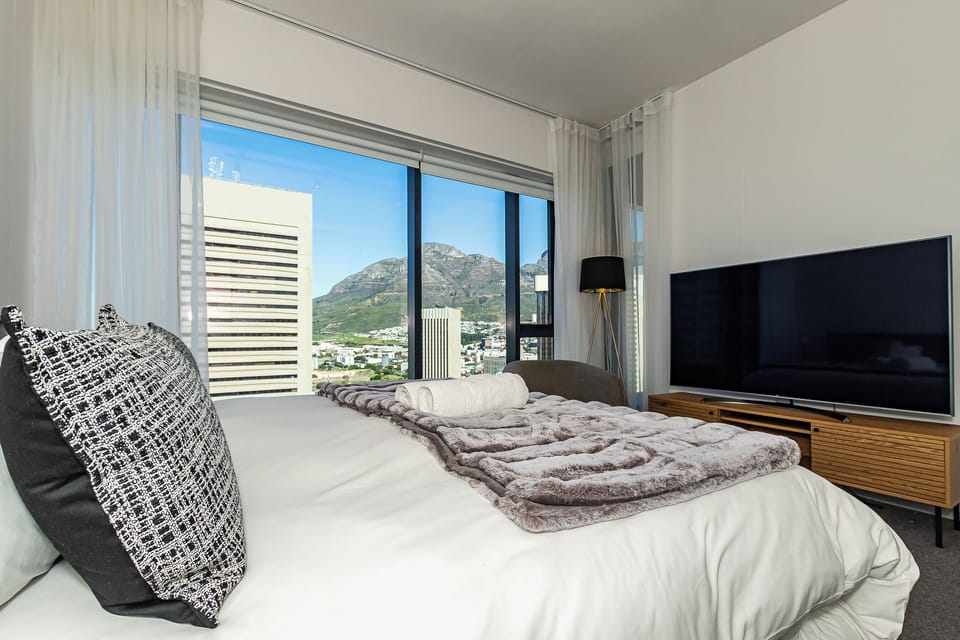 Luxury Apartment, Balcony, Mountain View | Blackout drapes, iron/ironing board, free WiFi
