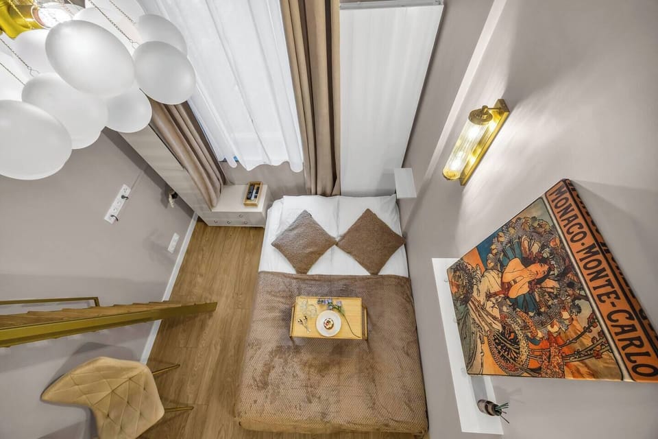 Cozy Studio with Sofa Bed and Mezzanine Bedroom | Book Now with RENTUJEMY