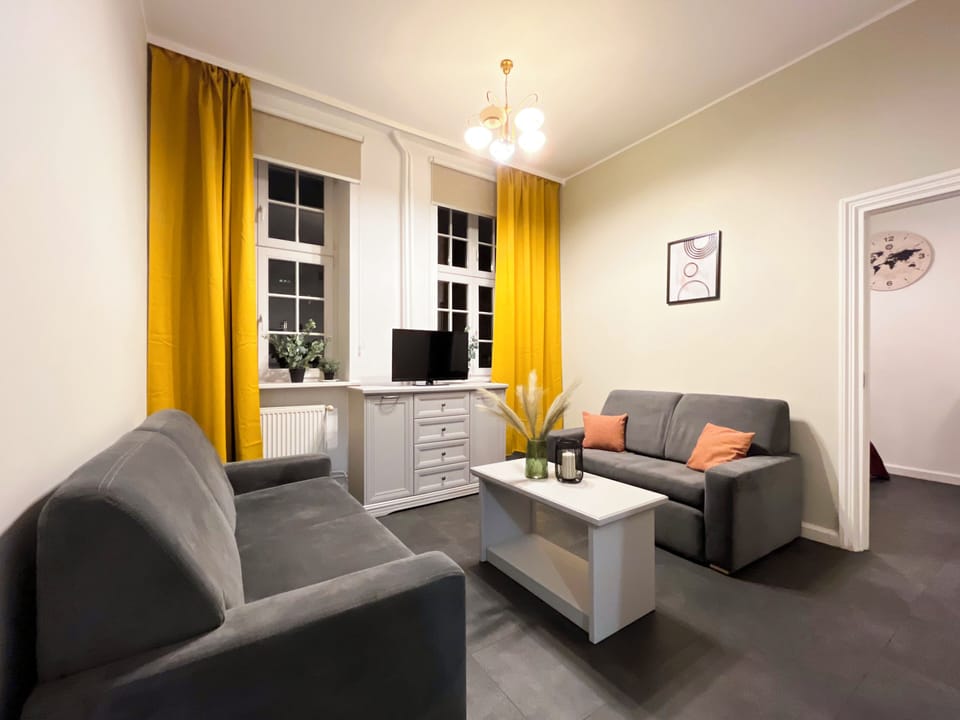 Apartment, Courtyard View | Living room | Flat-screen TV