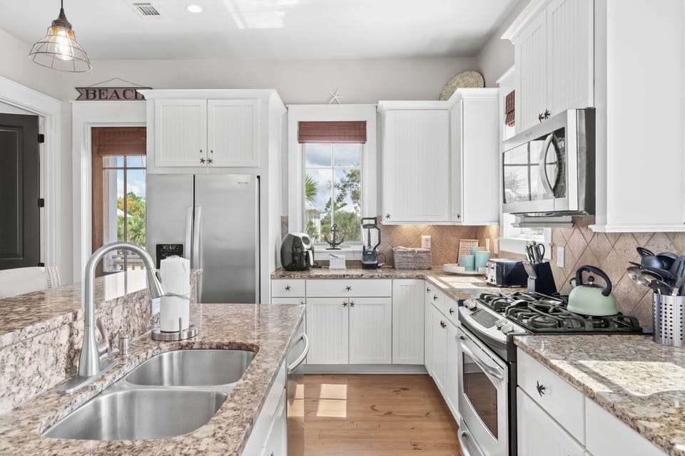 Fully equipped kitchen with ample counter space.