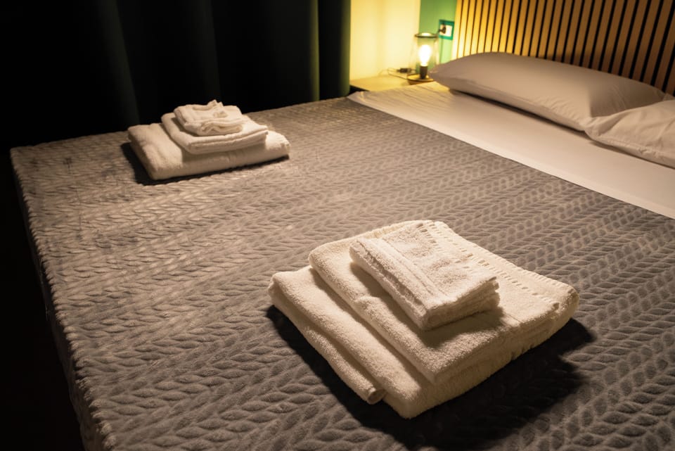 Family Room | Hypo-allergenic bedding, down comforters, memory foam beds, minibar