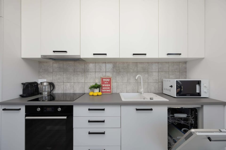 Functional kitchen with ample countertop space and modern appliances.